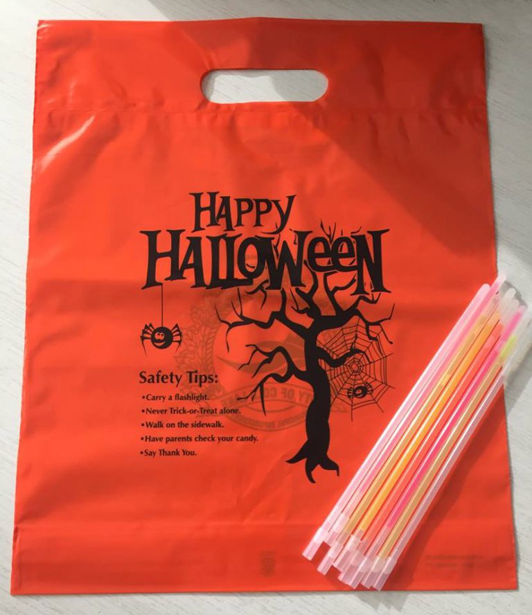 Cold Lake Peace Officers Handing Out Bags, Glow Sticks on Halloween