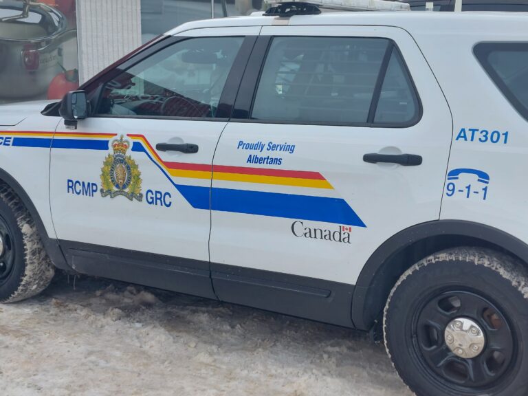 Lac La Biche RCMP arrest two after hit and run collision involving a firearm