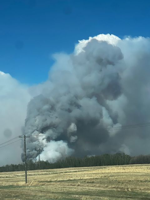Cooler temperatures, scattered showers lend a hand in battle against wildfires in parts of Alberta